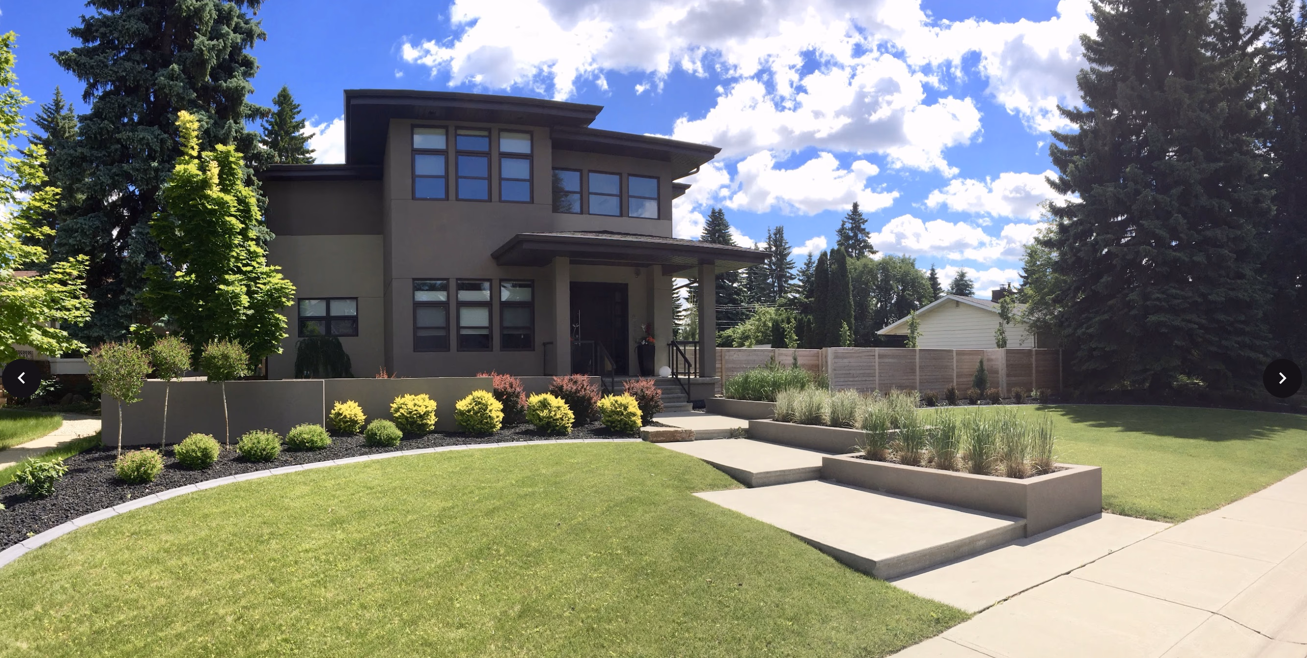 well landscaped property with nice front lawn